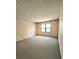 Neutral bedroom with natural light, carpet flooring and simple features for versatile use at 6638 Greenslake Point, Myrtle Beach, SC 29588