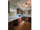 Functional kitchen with wood cabinets, laminate countertops, and stainless steel appliances at 6638 Greenslake Point, Myrtle Beach, SC 29588