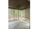 Back porch screened in with concrete slab and metal roof at 6638 Greenslake Point, Myrtle Beach, SC 29588