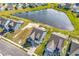 A beautiful neighborhood featuring stunning homes next to a tranquil pond at 684 Wailea Circle, Little River, SC 29566