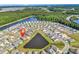 Community overview with water feature and green space; locator symbol indicates property location at 684 Wailea Circle, Little River, SC 29566