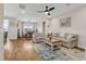 Inviting living room and dining room featuring hardwood floors, neutral tones, and lots of natural light at 684 Wailea Circle, Little River, SC 29566