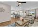Open living space with a view of the modern kitchen, dining area, and comfortable sitting area at 684 Wailea Circle, Little River, SC 29566