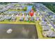 Aerial view showcasing the neighborhood with pond and community layout at 732 Mustang Ranch Dr., Myrtle Beach, SC 29588