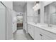 Bathroom includes a double sink vanity, great natural light, and tile flooring at 732 Mustang Ranch Dr., Myrtle Beach, SC 29588