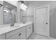 Bright bathroom features a double sink vanity, lots of storage, and tile flooring at 732 Mustang Ranch Dr., Myrtle Beach, SC 29588