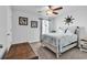 Well-lit bedroom with neutral walls, a ceiling fan, cozy carpets, and a window view of the outdoors at 732 Mustang Ranch Dr., Myrtle Beach, SC 29588