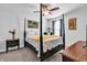 Bedroom with four-poster bed, neutral walls, complemented by coordinated decor and furnishings at 732 Mustang Ranch Dr., Myrtle Beach, SC 29588