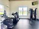Bright fitness center with treadmills and other cardio equipment, with views of the lake at 732 Mustang Ranch Dr., Myrtle Beach, SC 29588