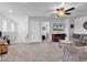 Inviting living room with modern furniture, a ceiling fan, plush seating and television viewing area at 732 Mustang Ranch Dr., Myrtle Beach, SC 29588