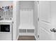 Convenient mudroom features built-in bench seating and coat hooks for organization by the entryway at 732 Mustang Ranch Dr., Myrtle Beach, SC 29588