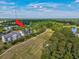 Aerial view showcasing the property's location near a beautiful golf course and lush greenery at 901 Knoll Shores Ct. # 304, Murrells Inlet, SC 29576