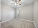 Bedroom features neutral carpet and a bright window with blinds at 901 Knoll Shores Ct. # 304, Murrells Inlet, SC 29576