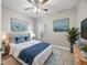 Main bedroom with a queen bed, coordinated decor and artwork at 901 Knoll Shores Ct. # 304, Murrells Inlet, SC 29576