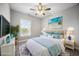 Stylishly staged main bedroom with a queen bed and coordinated decor at 901 Knoll Shores Ct. # 304, Murrells Inlet, SC 29576