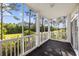 Screened porch offering stunning views of the golf course and surrounding greenery at 901 Knoll Shores Ct. # 304, Murrells Inlet, SC 29576