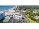 Stunning aerial view of oceanfront condo with beautiful beach, tennis court, and waterway access at 9400 Shore Dr. # 206, Myrtle Beach, SC 29572
