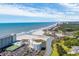 Breathtaking aerial view of the resort alongside the beach and waterway at 9400 Shore Dr. # 206, Myrtle Beach, SC 29572