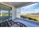 Balcony view of a beach and pool, combining coastal scenery and convenient recreational amenities at 9400 Shore Dr. # 206, Myrtle Beach, SC 29572
