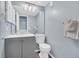 Clean bathroom with gray vanity, modern fixtures, and a well-lit mirror at 9400 Shore Dr. # 206, Myrtle Beach, SC 29572