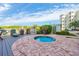 Relaxing pool area, perfect for leisure and recreation, surrounded by landscaping and amenities at 9400 Shore Dr. # 206, Myrtle Beach, SC 29572