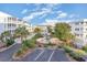 Scenic community aerial view showcasing the playground, pool, parking, and surrounding landscape at 9581 Shore Dr. # 216, Myrtle Beach, SC 29572