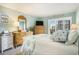 Bedroom with a king size bed, dresser with mirror, and balcony access at 9581 Shore Dr. # 216, Myrtle Beach, SC 29572