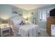Bedroom decorated with coastal themes, complete with a dresser and window at 9581 Shore Dr. # 216, Myrtle Beach, SC 29572