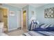 Inviting bedroom featuring two twin beds, coastal decor, and closet storage space at 9581 Shore Dr. # 216, Myrtle Beach, SC 29572