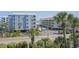 View of several condo buildings with balconies, palm trees and ocean in the distance at 9581 Shore Dr. # 216, Myrtle Beach, SC 29572
