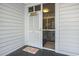 Condo entrance with themed decor, including a 'Mermaid' sign and humorous door mat at 9581 Shore Dr. # 216, Myrtle Beach, SC 29572