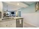 View of the kitchen area with stainless steel appliances and access to the living area at 9581 Shore Dr. # 216, Myrtle Beach, SC 29572