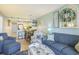 Inviting living area with a view of the kitchen and a coastal-inspired design at 9581 Shore Dr. # 216, Myrtle Beach, SC 29572
