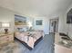 Comfortable bedroom showcasing a beach themed decor, and bright modern colors at 9650 Shore Dr. # 1203, Myrtle Beach, SC 29572