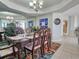 Inviting dining room with elegant furnishings and decor, perfect for Gathering meals and entertaining guests at 9650 Shore Dr. # 1203, Myrtle Beach, SC 29572