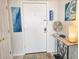 Inviting entryway with stylish décor, including unique artwork and a decorative table, creating a welcoming ambiance at 9650 Shore Dr. # 1203, Myrtle Beach, SC 29572