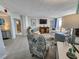 Comfortable living room featuring a flat screen TV, stylish furnishings, and access to a balcony with an ocean view at 9650 Shore Dr. # 1203, Myrtle Beach, SC 29572