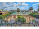 View of community tennis courts with lounge areas from private balcony at 9650 Shore Dr. # 1203, Myrtle Beach, SC 29572