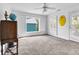 Cozy room with carpet, and a large window and door that brings the outside in at 99 Berry Tree Dr., Pawleys Island, SC 29585