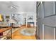 Elegant entryway with hardwood floors, staircase, and stylish decor creates a welcoming atmosphere at 99 Berry Tree Dr., Pawleys Island, SC 29585