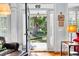 Open doorway to a beautiful living area with ample natural light and stylish furnishings at 99 Berry Tree Dr., Pawleys Island, SC 29585