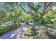 Picturesque street view showcasing lush trees and well-manicured lawns creating a serene setting at 99 Berry Tree Dr., Pawleys Island, SC 29585