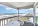 Enjoy stunning ocean views from the private balcony, complete with seating, perfect for relaxation at 1011 S Ocean Blvd., Surfside Beach, SC 29575