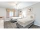 Bright bedroom featuring two twin beds, neutral decor, and ample closet space at 1011 S Ocean Blvd., Surfside Beach, SC 29575