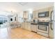 Well-equipped kitchen with stainless steel appliances and ample cabinet space at 1011 S Ocean Blvd., Surfside Beach, SC 29575
