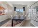 Bright dining room with stylish chairs, large table, and window with modern curtains at 1013 Hainer Place Dr, Conway, SC 29526