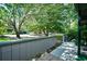 View of the back yard featuring mature trees and greenery at 10301 N Kings Hwy. # 21-5, Myrtle Beach, SC 29572