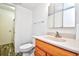Cozy bathroom with light wood vanity, neutral counters, and a mirrored medicine cabinet at 10301 N Kings Hwy. # 21-5, Myrtle Beach, SC 29572