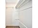 Walk-in closet provides ample storage space with wire shelving and hanging rods for clothing and accessories at 10301 N Kings Hwy. # 21-5, Myrtle Beach, SC 29572