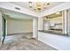 View of the dining area with a kitchen pass-through and view of the living room area at 10301 N Kings Hwy. # 21-5, Myrtle Beach, SC 29572